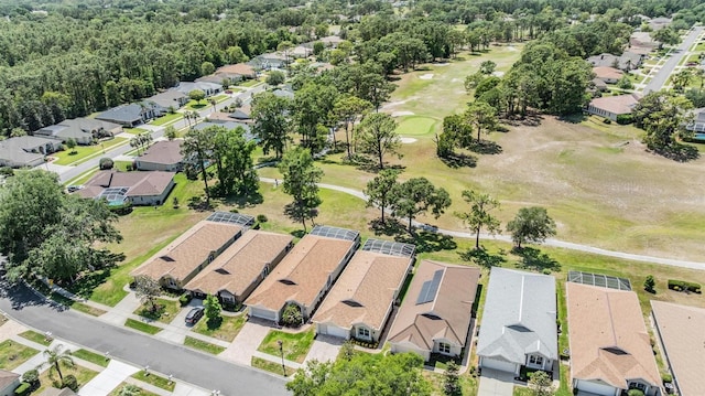 drone / aerial view with a residential view and view of golf course