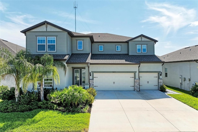 13071 Willow Grove Dr, Riverview, FL 33579 - craftsman house featuring an attached garage, a shingled roof, stone siding, stucco siding, and concrete driveway