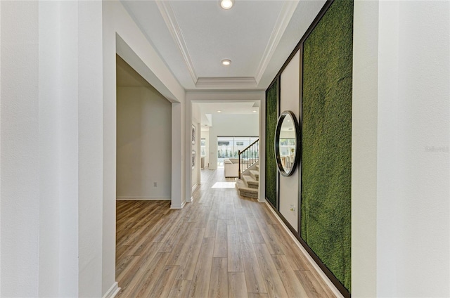 13071 Willow Grove Dr, Riverview, FL 33579 - hallway with crown molding, stairway, baseboards, light wood-style floors, and recessed lighting