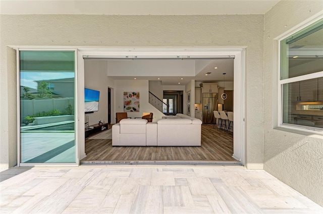 13071 Willow Grove Dr, Riverview, FL 33579 - living area featuring a textured wall and stairway