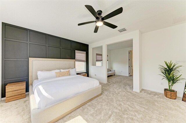 13071 Willow Grove Dr, Riverview, FL 33579 - bedroom featuring baseboards, ceiling fan, light carpet, and visible vents