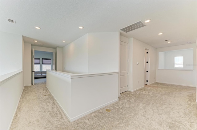 13071 Willow Grove Dr, Riverview, FL 33579 - hall featuring light carpet, recessed lighting, and visible vents