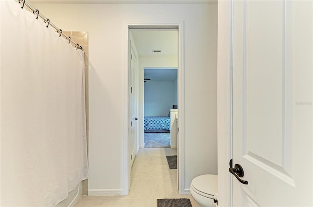 13071 Willow Grove Dr, Riverview, FL 33579 - full bathroom featuring a shower with curtain, visible vents, tile patterned flooring, baseboards, and toilet