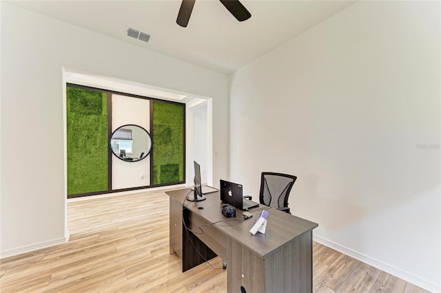 13071 Willow Grove Dr, Riverview, FL 33579 - office space with visible vents, light wood finished floors, ceiling fan, and baseboards