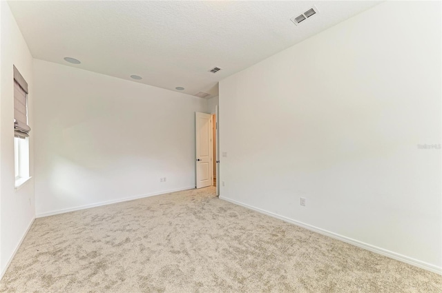 13071 Willow Grove Dr, Riverview, FL 33579 - unfurnished room with visible vents, baseboards, and light colored carpet