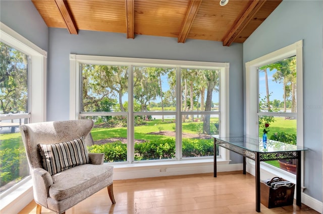 16470 Oakview Cir, Alva, FL 33920 - sunroom / solarium with wooden ceiling, beam ceiling, a water view, baseboards, and hardwood / wood-style floors