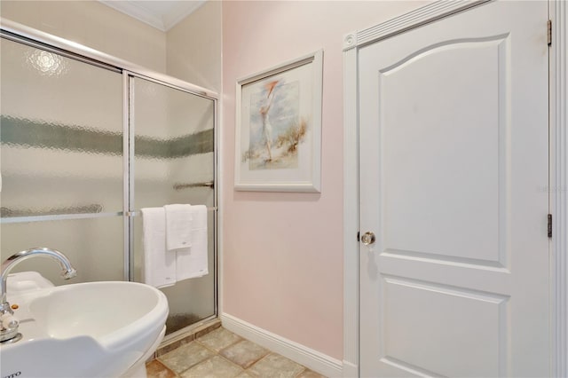 16470 Oakview Cir, Alva, FL 33920 - full bath featuring ornamental molding, a sink, a shower stall, and baseboards
