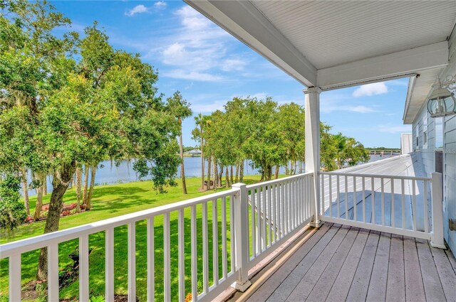 16470 Oakview Cir, Alva, FL 33920 - wooden terrace with covered porch, a yard, and a water view
