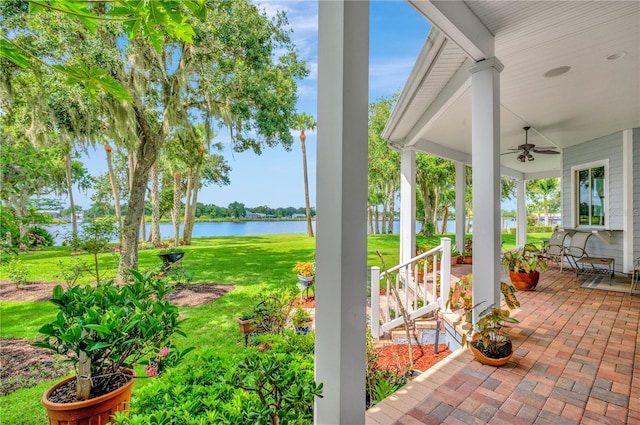 16470 Oakview Cir, Alva, FL 33920 - view of patio / terrace with a porch, ceiling fan, and a water view