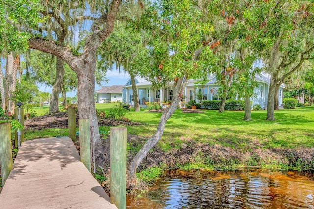 16470 Oakview Cir, Alva, FL 33920 - view of dock featuring a water view and a yard