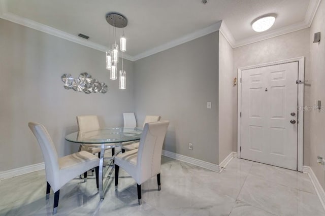 dining room with crown molding, baseboards, visible vents, and marble finish floor