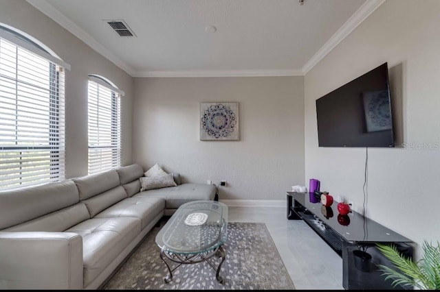 living area featuring crown molding, baseboards, and visible vents