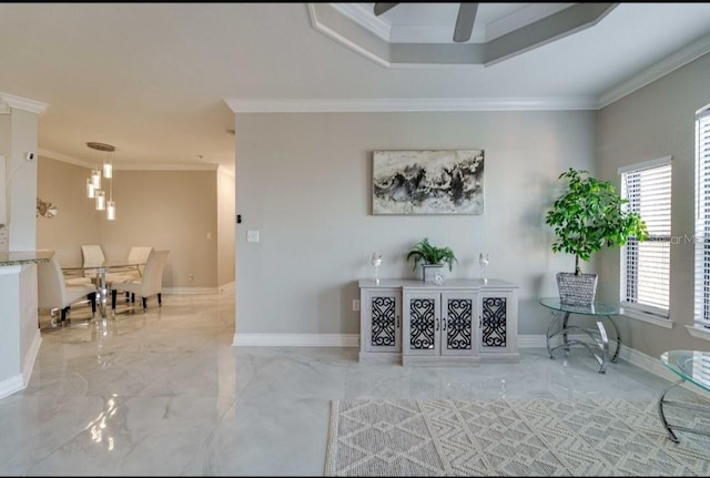 interior space with crown molding, baseboards, and marble finish floor