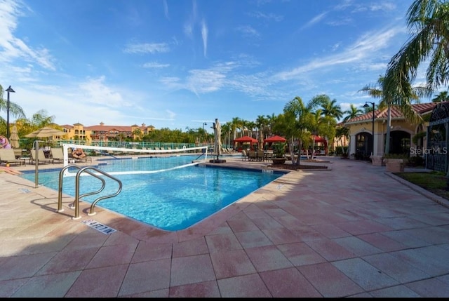 pool with a patio area