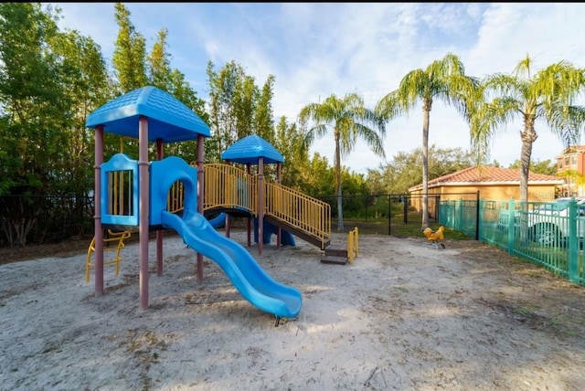 community jungle gym with fence