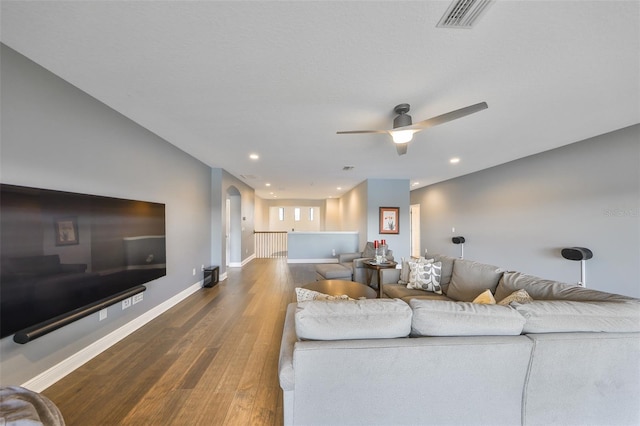 11909 Climbing Fern Ave, Riverview, FL 33579 - living area featuring visible vents, baseboards, recessed lighting, wood finished floors, and a ceiling fan