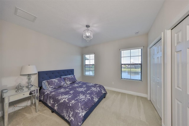 11909 Climbing Fern Ave, Riverview, FL 33579 - bedroom featuring carpet flooring, visible vents, and baseboards