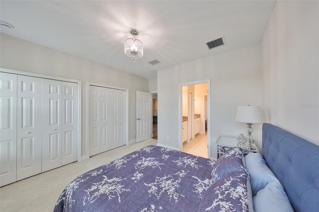 11909 Climbing Fern Ave, Riverview, FL 33579 - bedroom with carpet flooring, visible vents, multiple closets, and baseboards