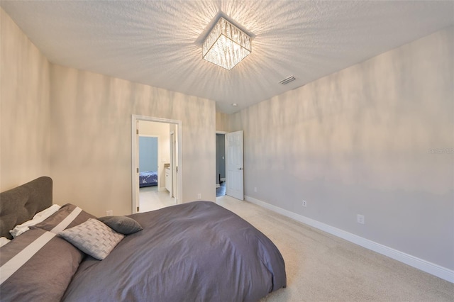 11909 Climbing Fern Ave, Riverview, FL 33579 - bedroom featuring an inviting chandelier, visible vents, light carpet, and baseboards