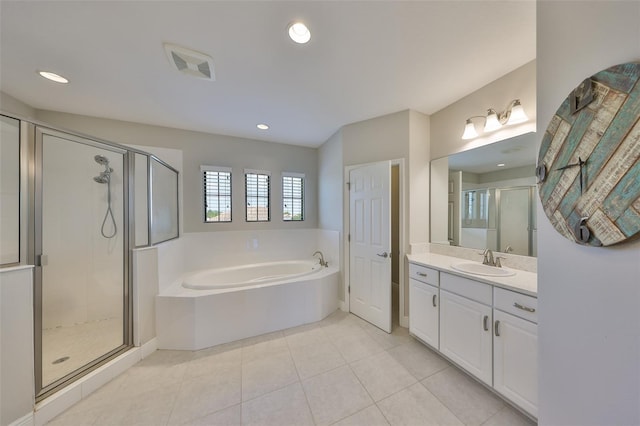 11909 Climbing Fern Ave, Riverview, FL 33579 - full bath with recessed lighting, vanity, a stall shower, a garden tub, and tile patterned flooring