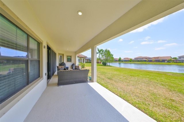 11909 Climbing Fern Ave, Riverview, FL 33579 - view of patio / terrace with a water view and a residential view