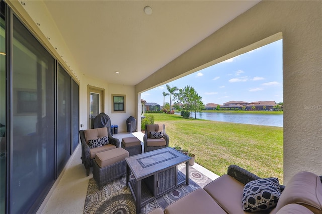 11909 Climbing Fern Ave, Riverview, FL 33579 - view of patio / terrace featuring a water view, a residential view, and an outdoor living space