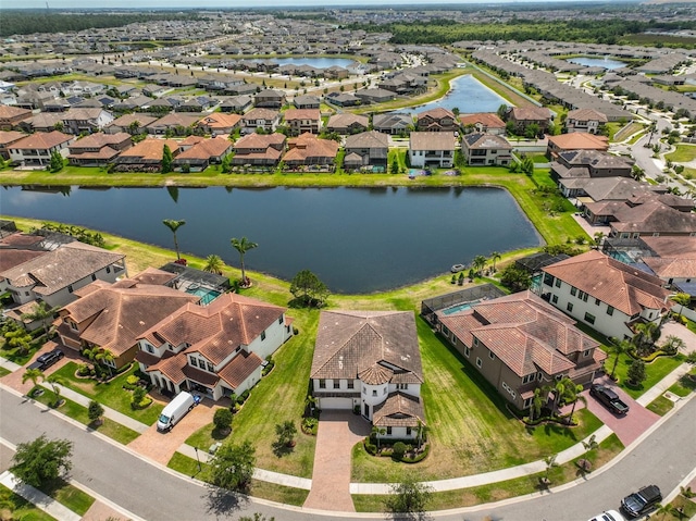 11909 Climbing Fern Ave, Riverview, FL 33579 - birds eye view of property with a water view and a residential view