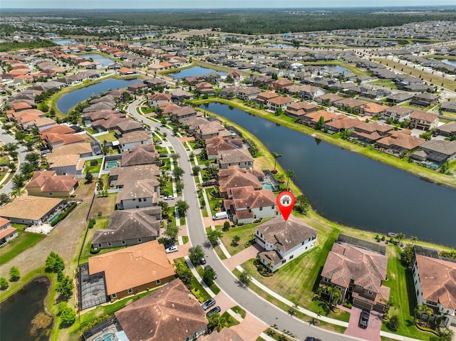 11909 Climbing Fern Ave, Riverview, FL 33579 - drone / aerial view with a residential view and a water view