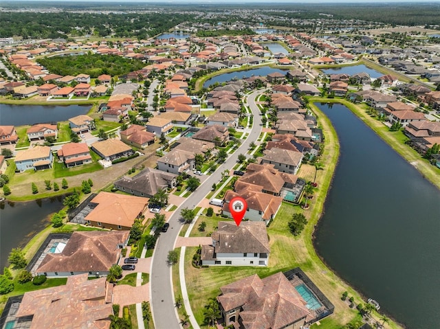 11909 Climbing Fern Ave, Riverview, FL 33579 - birds eye view of property with a water view and a residential view