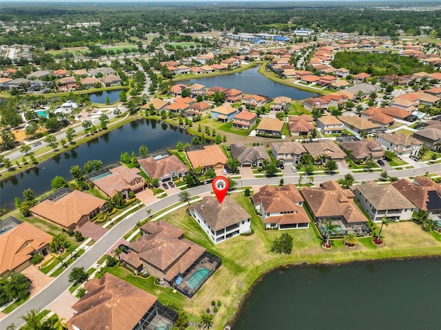 11909 Climbing Fern Ave, Riverview, FL 33579 - aerial view with a residential view and a water view