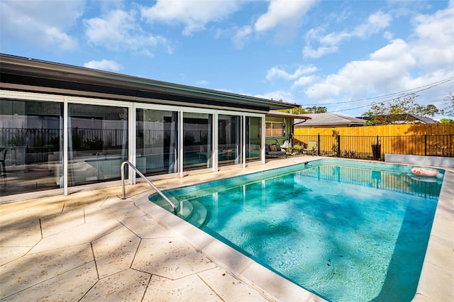 307 Orangewood Ln, Largo, FL 33770 - view of swimming pool featuring fence, a patio area, and a fenced in pool