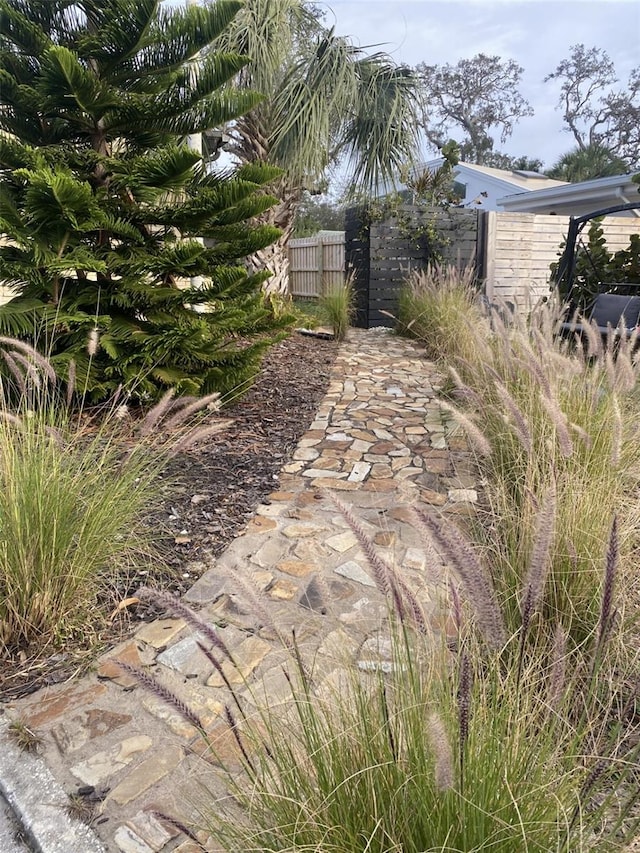 307 Orangewood Ln, Largo, FL 33770 - view of yard featuring a gate and fence