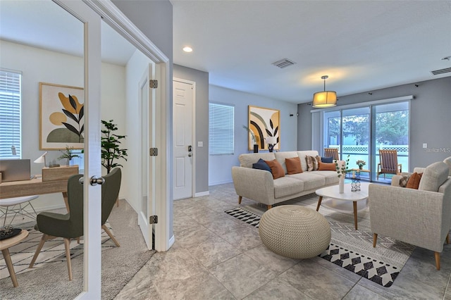 living room with recessed lighting, baseboards, light tile patterned floors, and visible vents