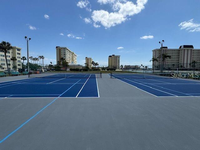 4725 Cove Cir Unit 604, Saint Petersburg, FL 33708 - view of tennis court with community basketball court