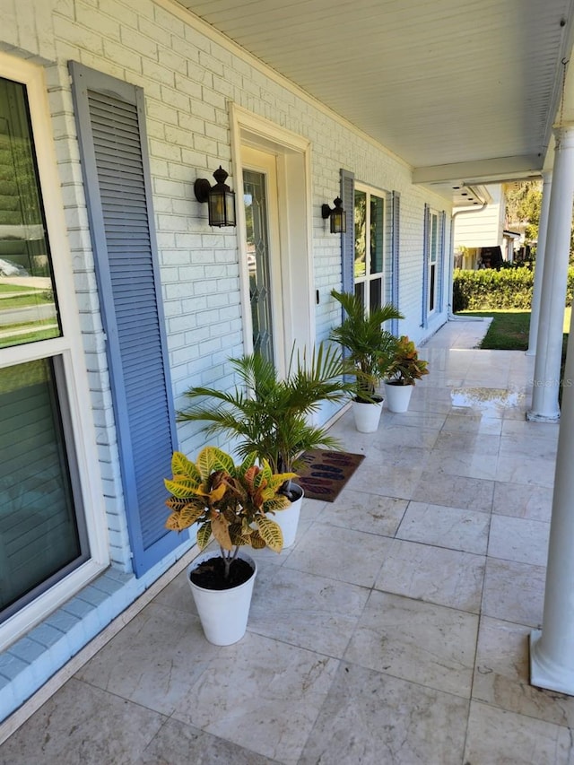 view of patio featuring a porch