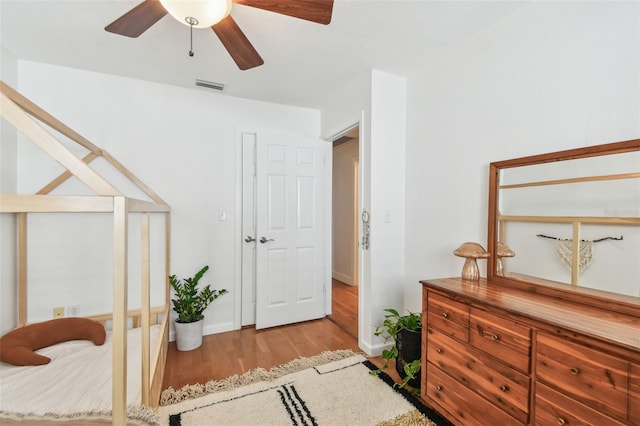 1735 Maryland Ave NE, Saint Petersburg, FL 33703 - interior space featuring wood finished floors, baseboards, and ceiling fan
