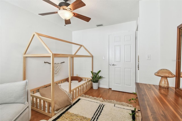 1735 Maryland Ave NE, Saint Petersburg, FL 33703 - bedroom featuring wood finished floors and a ceiling fan