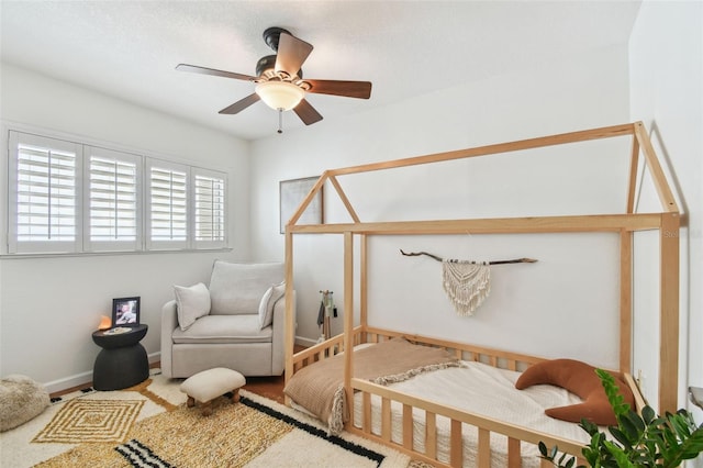 1735 Maryland Ave NE, Saint Petersburg, FL 33703 - bedroom with baseboards and ceiling fan