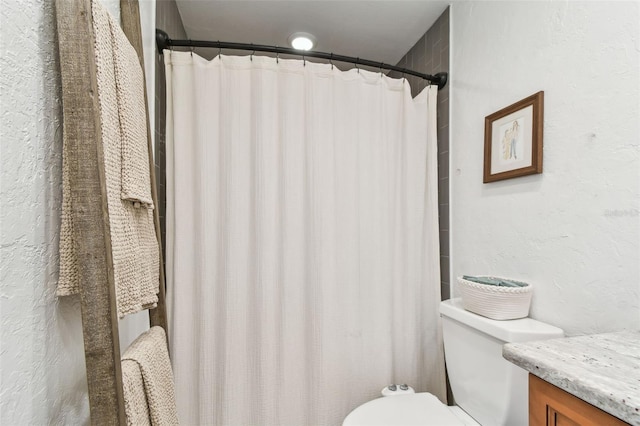 1735 Maryland Ave NE, Saint Petersburg, FL 33703 - full bathroom featuring toilet, vanity, and a shower with shower curtain