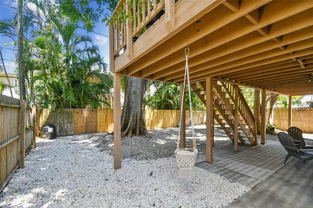 1735 Maryland Ave NE, Saint Petersburg, FL 33703 - view of patio / terrace with a fenced backyard and stairs
