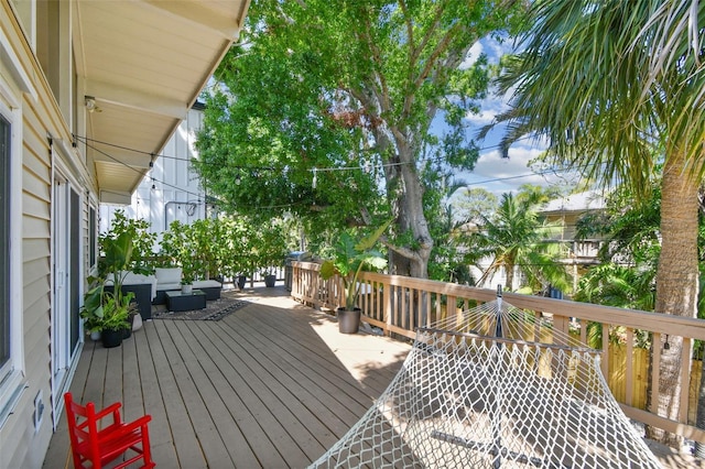 1735 Maryland Ave NE, Saint Petersburg, FL 33703 - wooden deck with outdoor lounge area