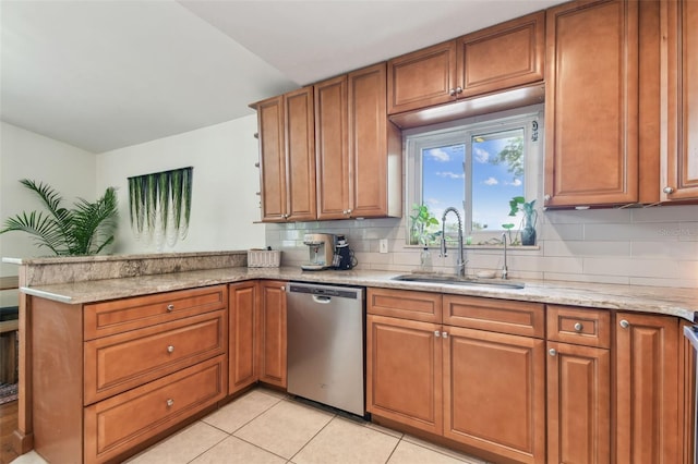 1735 Maryland Ave NE, Saint Petersburg, FL 33703 - kitchen with dishwasher, a sink, a peninsula, brown cabinetry, and tasteful backsplash