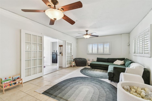 1735 Maryland Ave NE, Saint Petersburg, FL 33703 - living area with tile patterned floors and ceiling fan
