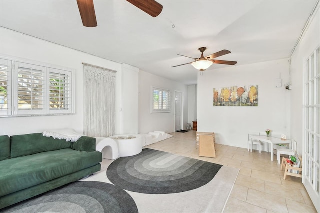 1735 Maryland Ave NE, Saint Petersburg, FL 33703 - tiled living area featuring ceiling fan