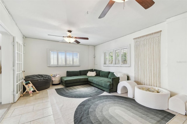 1735 Maryland Ave NE, Saint Petersburg, FL 33703 - tiled living room featuring ceiling fan
