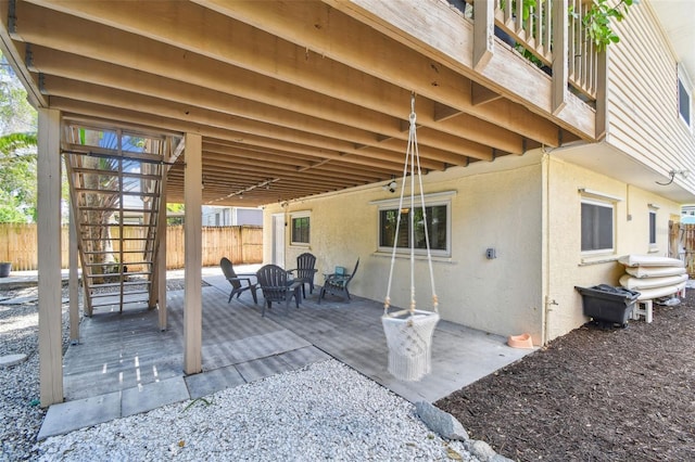 1735 Maryland Ave NE, Saint Petersburg, FL 33703 - view of patio featuring stairway and fence
