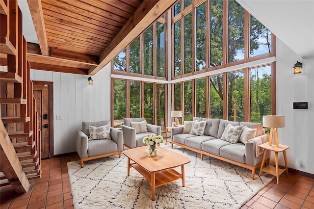 sunroom with beamed ceiling and a wealth of natural light