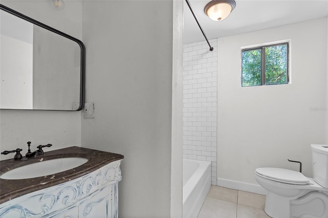 bathroom with tile patterned floors, vanity, toilet, and tub / shower combination