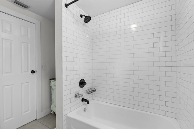 bathroom with  shower combination, visible vents, and tile patterned flooring