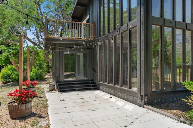 exterior space with a patio area and a balcony